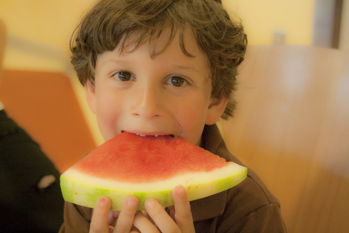 Eating watermelon. Eat Watermelon. Kid boy eating Watermelon. A boy eating Watermelon. Watermelon eating Competition among students.